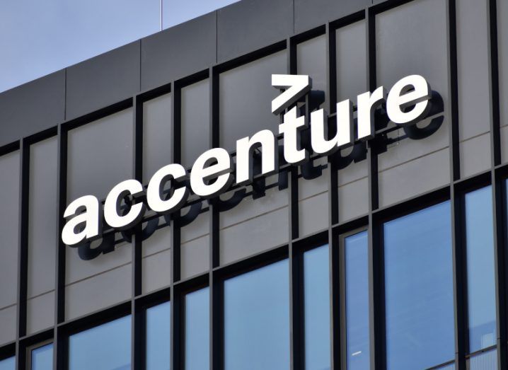 The Accenture logo on the front façade of a building.